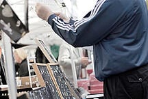 A guy shopping for jewlry in Karl Johan in Oslo.
